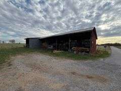Former Property of the Late Bobby & Joyce Eastridge - 160+/- Acres, Brick House, Farm Equipment, & Personal Property