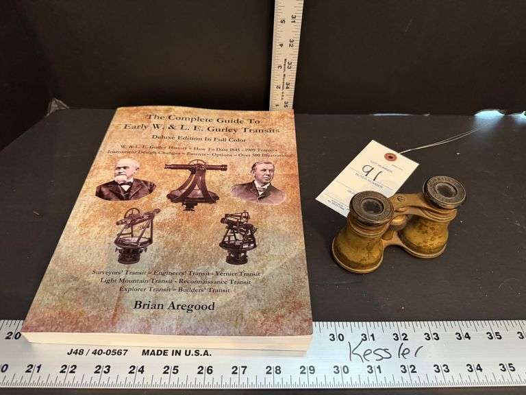 Old binoculars and book