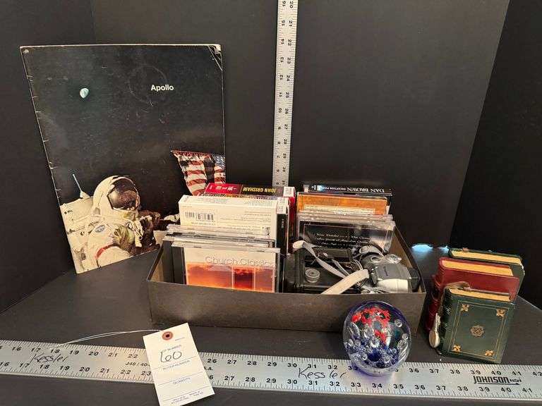 Books, CD’s, traveler camera, misc