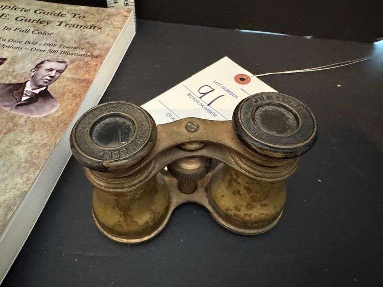 Old binoculars and book