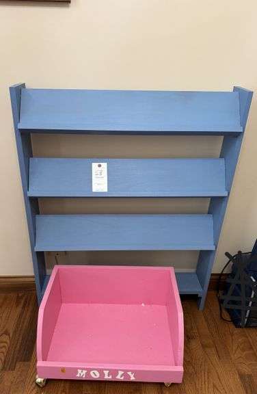 Bookshelf and dog bed on wheels