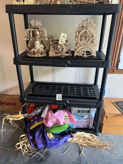 Black shelf and what is on bottom
