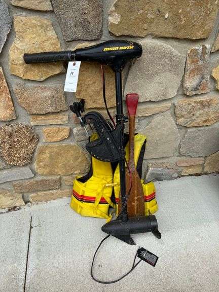 Minn-kota trolling motor, life jacket, paddle