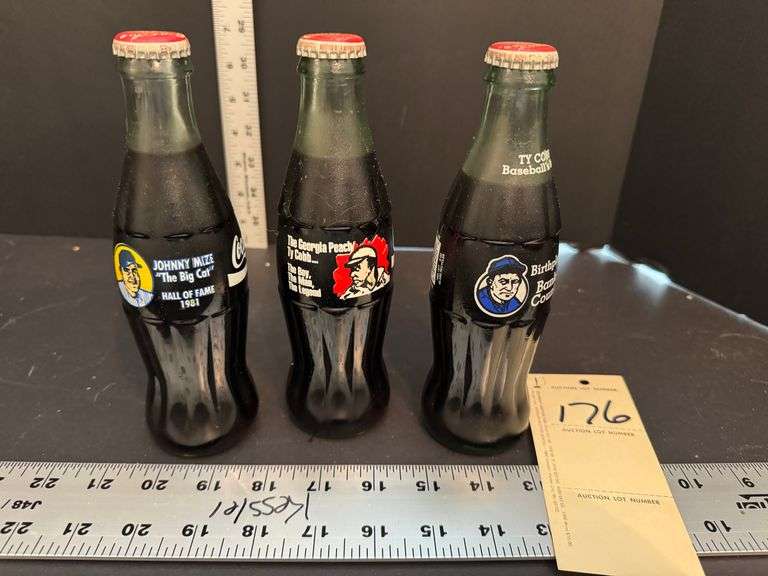 3 Coca Cola collector bottles