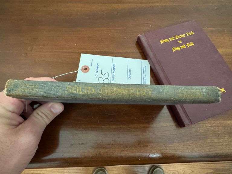 Army and navy song book and solid geometry book