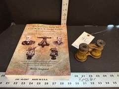 Old binoculars and book