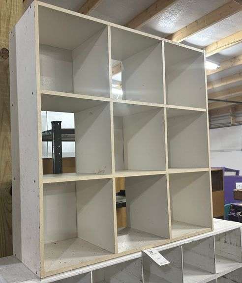 2 white cubby hole shelfs
