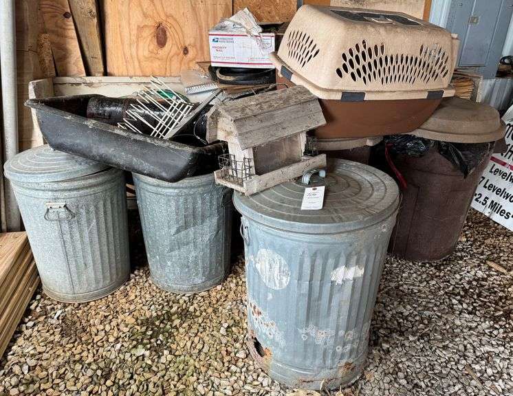 Trash cans, dog carrier, bench,