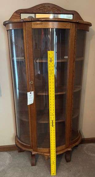 Bow front curio cabinet