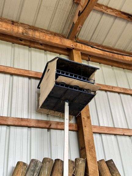 Bird house on long aluminum pole