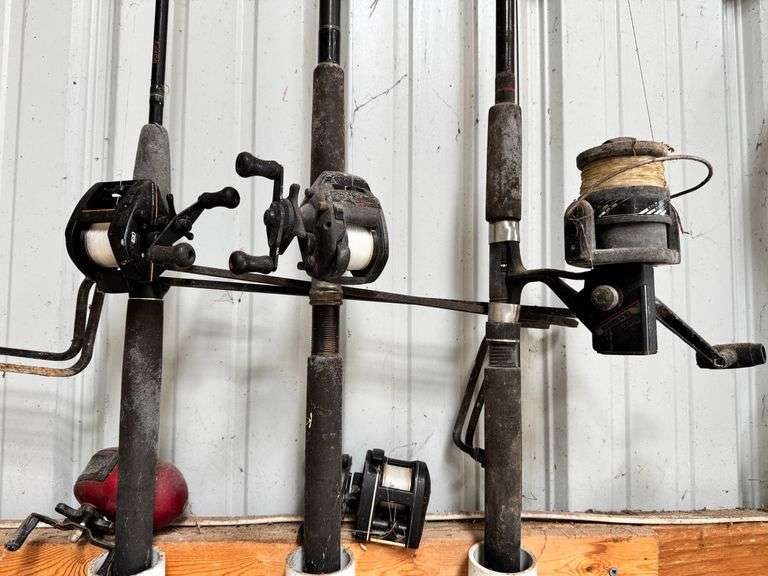 3 fishing poles, 2 reels, 2 stands