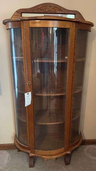 Bow front curio cabinet