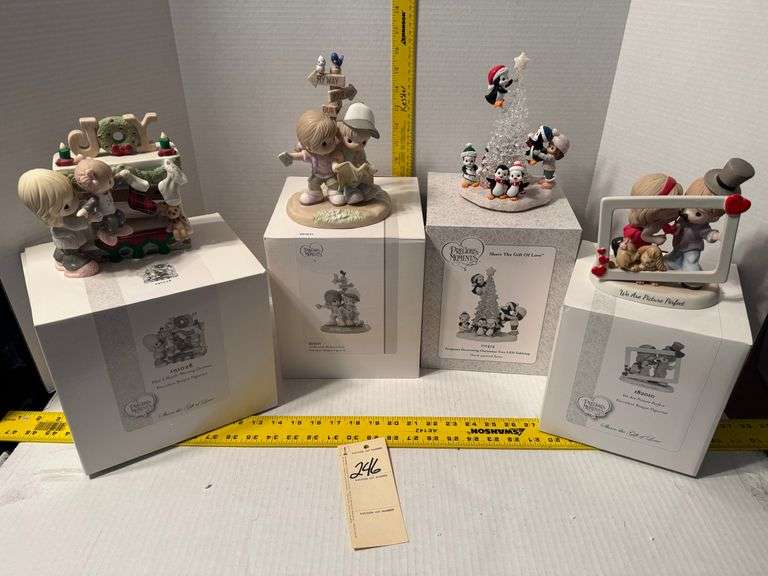 4 precious moments figurines