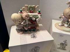 4 precious moments figurines