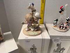 4 precious moments figurines