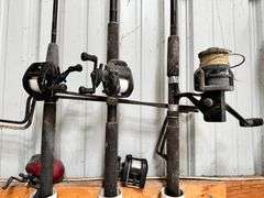 3 fishing poles, 2 reels, 2 stands