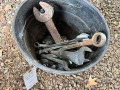 Bucket of wrenches and hammer