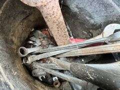 Bucket of wrenches and hammer