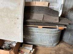 Pipe fittings, wire, water tank, roofing, misc