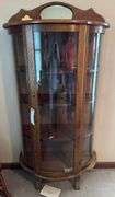 Bow front curio cabinet