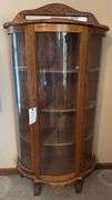 Bow front curio cabinet