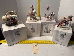 4 precious moments figurines