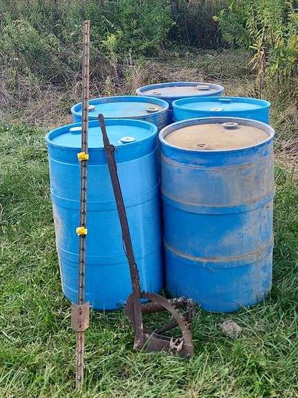 Cultivator Lift Arm, T-Post, & (5) 55 Gallon Drums