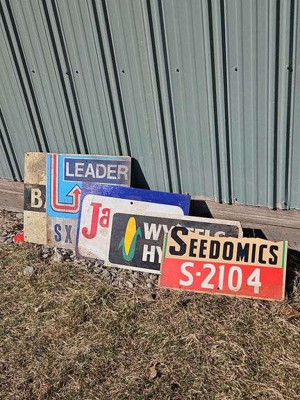 Barten Sign With Other Seed Corn Signs - Kraft Auction Service, LLC