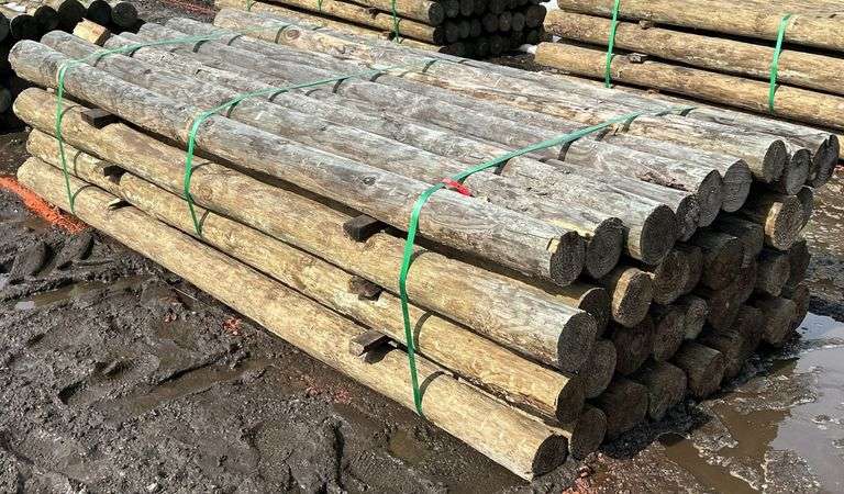 4" x 8' Treated Posts, 36 Posts - Kraft Auction Service, LLC