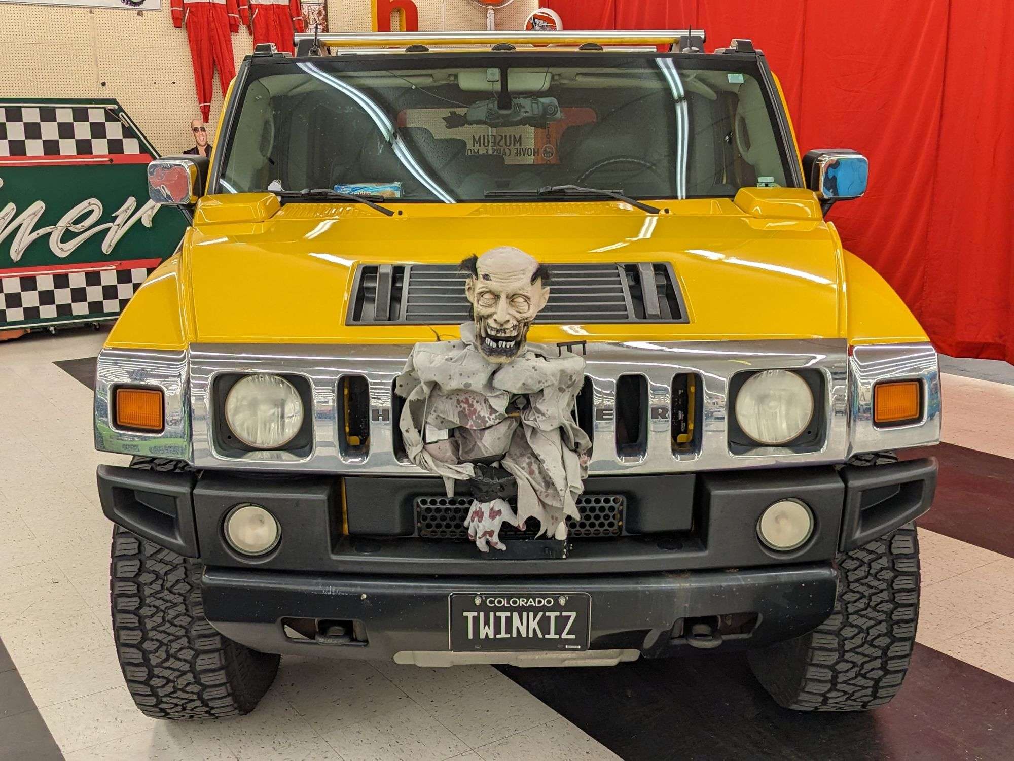 HUMMER 2004 HUMMER H2 with 24x14 -76 American Truxx Vortex and 35/13.5R24