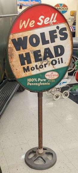 Vintage DST Wolf’s Head Motor Oil Curb Sign