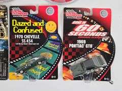 (7) 1/64 Die-Cast Cars In Blister Packages
