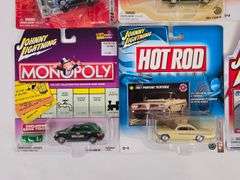 (9) Johnny Lightning Die-Cast Cars In Blister Packages