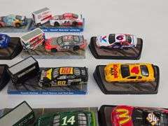 (14) 1/64 Scale Die-Cast Nascar Stock Cars On Display Stands