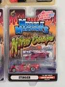(4) 1/64 Scale Muscle Machines Cars In Blister Packages