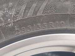 (AE) Dunlop SP Winter Sport Tires w/ Rim