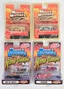 (4) 1/64 Scale Muscle Machines Cars In Blister Packages