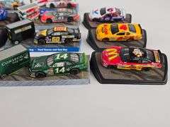 (14) 1/64 Scale Die-Cast Nascar Stock Cars On Display Stands