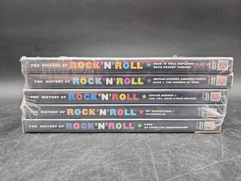 (S) Rock N' Roll DVDs & AC/DC Playing Cards - Kraft Auction Service, LLC