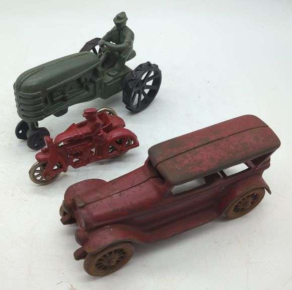 (DE) Cast Iron Plow, automobile and Motorcycle. Approx 3" tallest.