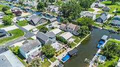 "LIVE" 2 Parcel Lake Wawasee Real Estate Auction - Syracuse, IN