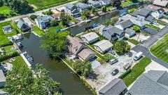 "LIVE" 2 Parcel Lake Wawasee Real Estate Auction - Syracuse, IN