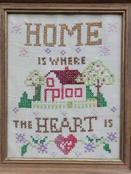 (Q) Framed Counted Crosstitch Piece Featuring Saying "Home Is Where The Heart Is"