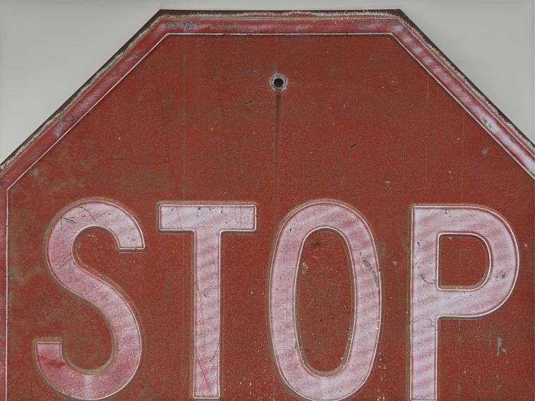 Vintage Embossed Metal Stop Sign