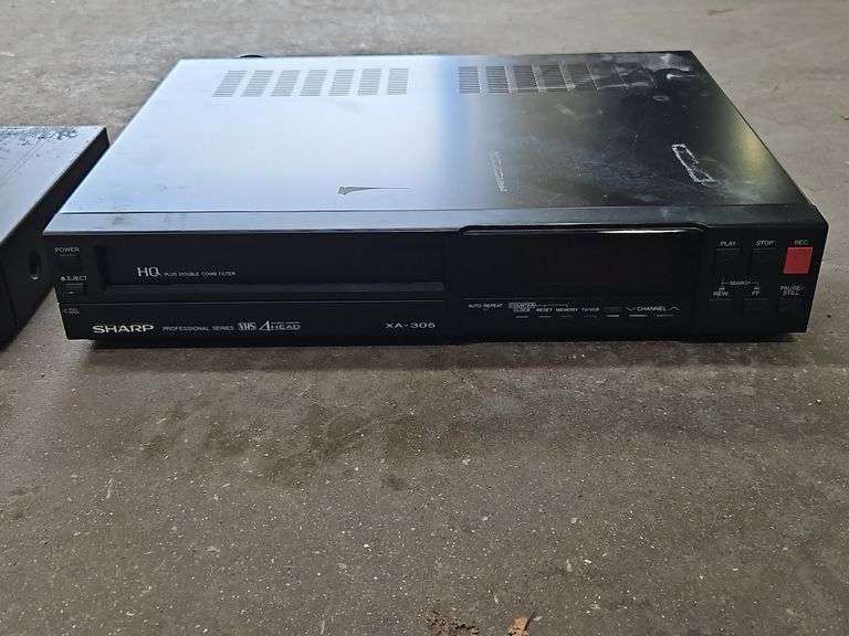 Samsung Progressive Scan Dvd Player & A Sharp Brand Professional Series VHS Player.