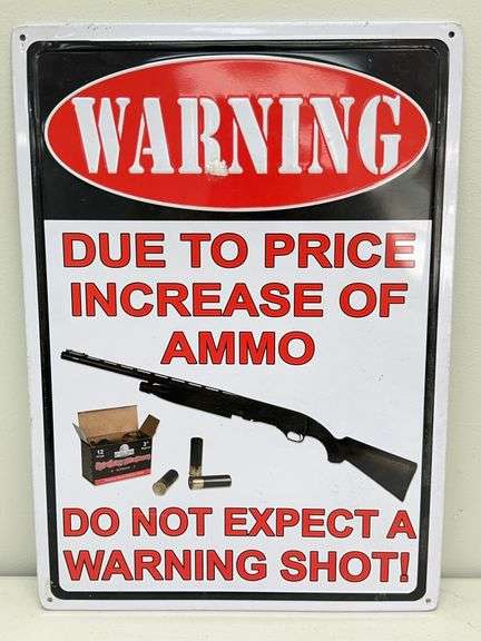 Warning Shot Embossed Metal Sign