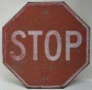 Vintage Embossed Metal Stop Sign