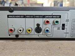 Samsung Progressive Scan Dvd Player & A Sharp Brand Professional Series VHS Player.