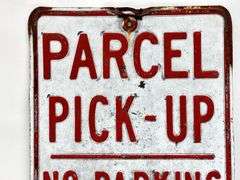 Vintage Parcel Pick-Up Embossed Metal Sign