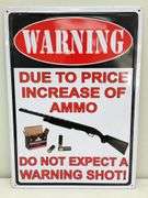 Warning Shot Embossed Metal Sign